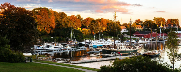 harbor at camden maine with boats during fall season - things to do in camden maine