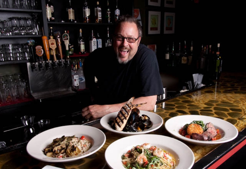 Restaurants in Rockland Maine - Rustica Restaurant Chef with his dishes