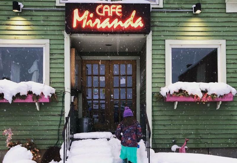 Cafe Miranda Rockland Maine - restaurant front entrance with little girl entering