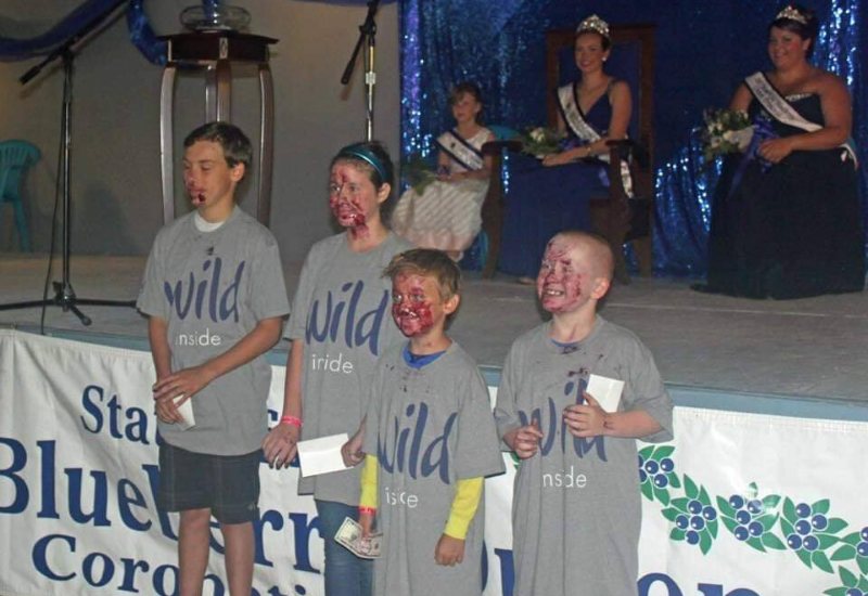 winners of the blueberry pie eating contest at the Wild Blueberry Festival & Union Fair Maine